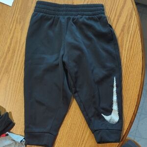 Nike Kids Black Sweatpants with White Logo